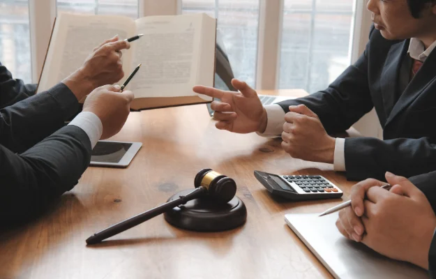 Businesspeople Meeting with Lawyers from Their Legal Team Discuss Your Case with Tosi Law body